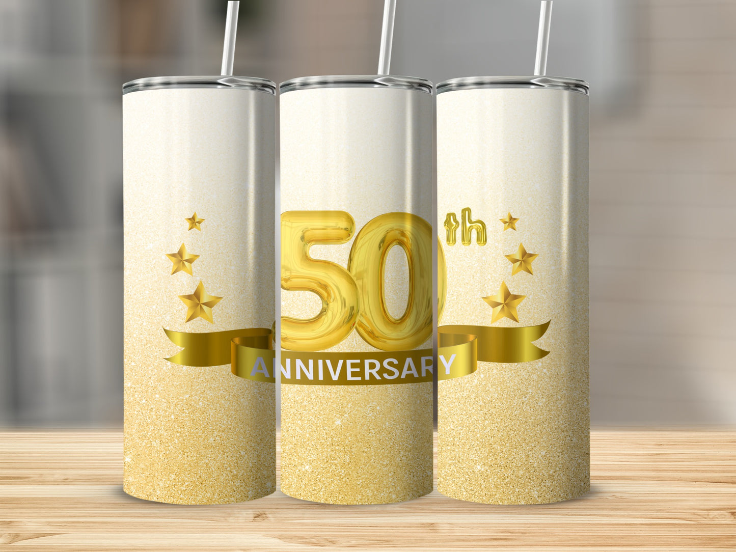 Gold 50th anniversary tumbler with stars and ribbon.