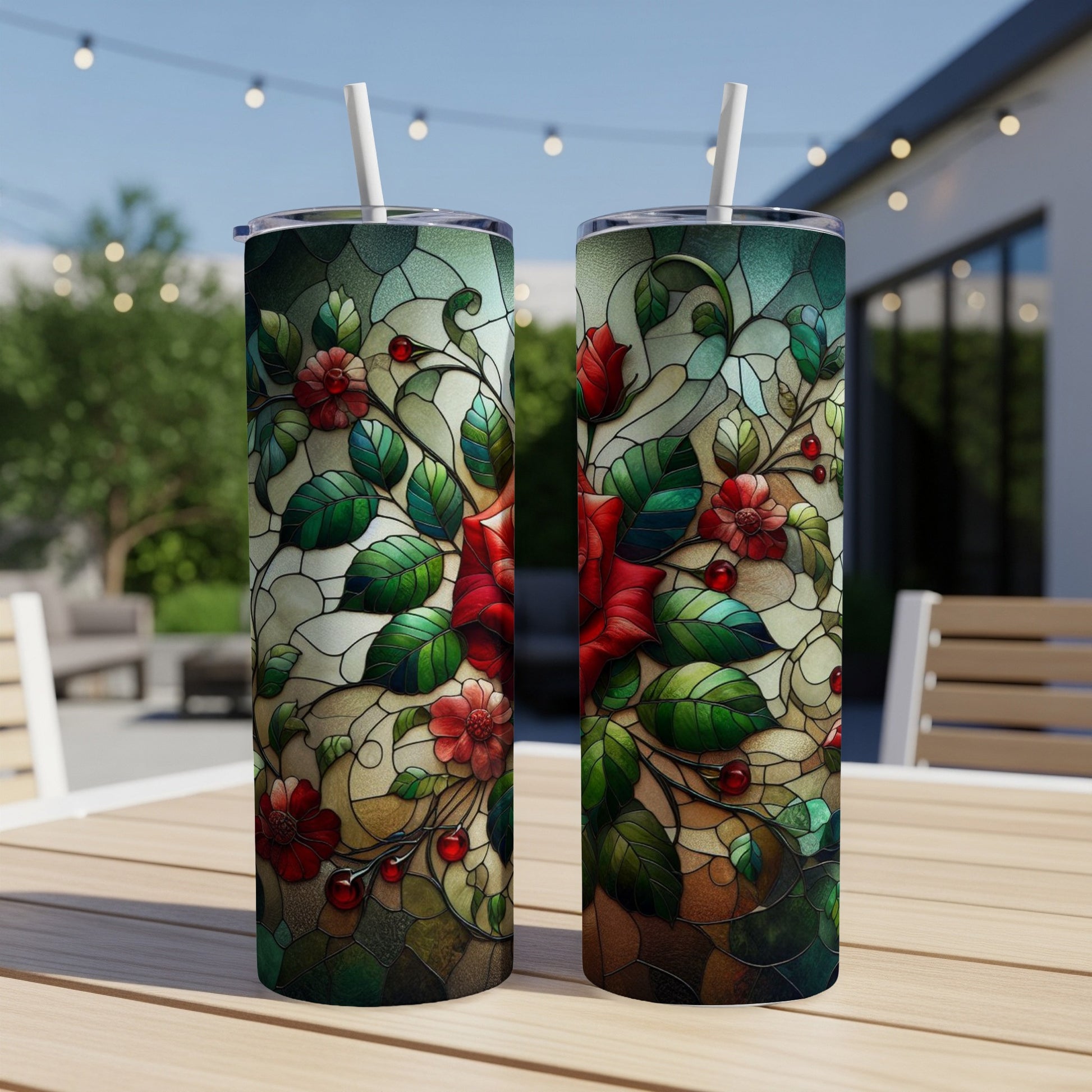 Two tumblers with stained-glass floral pattern of red roses and green leaves.