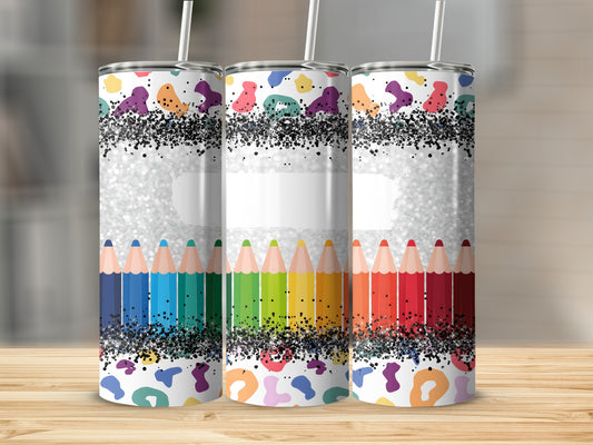 Colorful pencil pattern tumbler with glitter and abstract speckles.