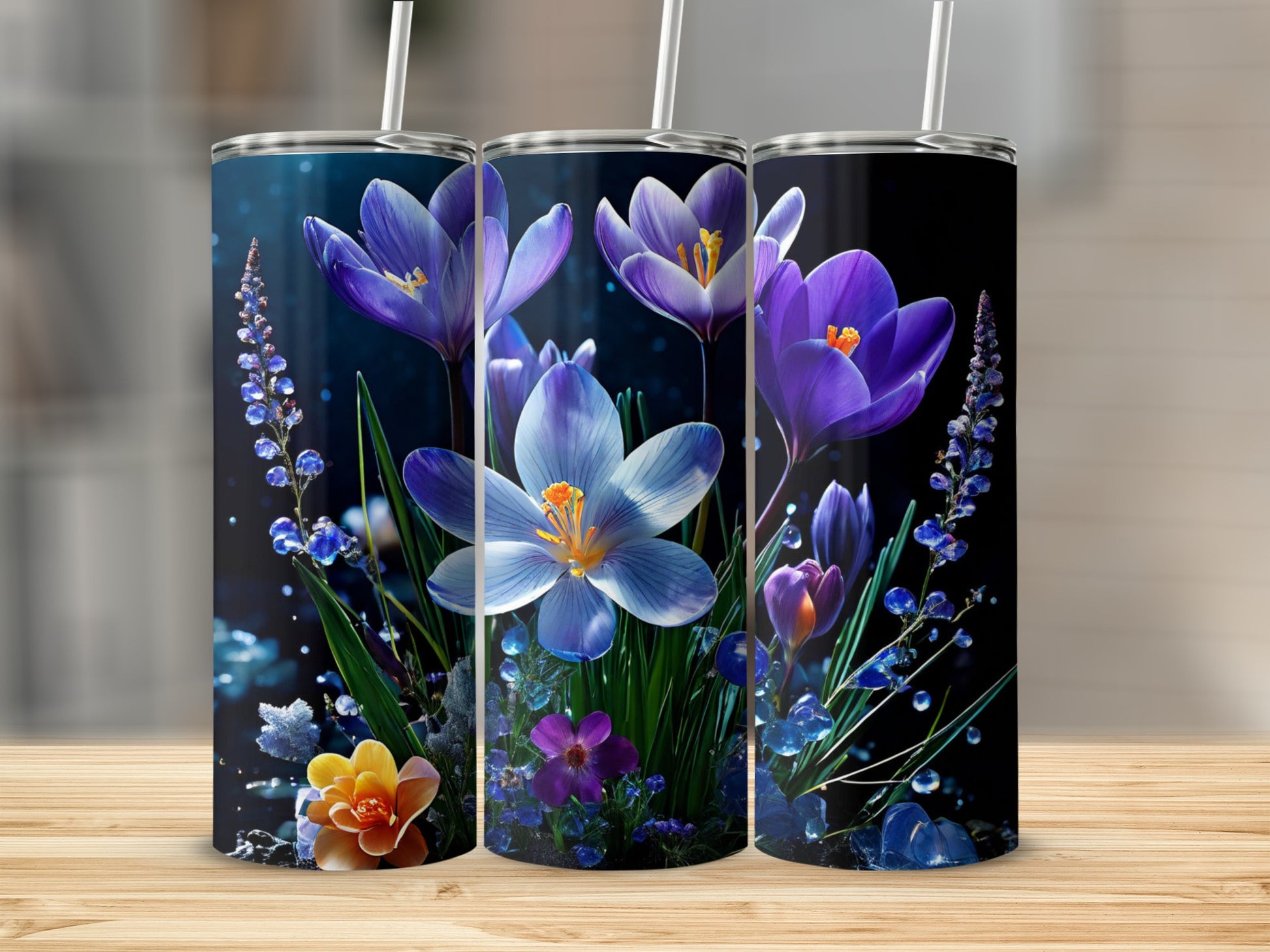 Three tumblers with purple crocuses and blue floral accents.