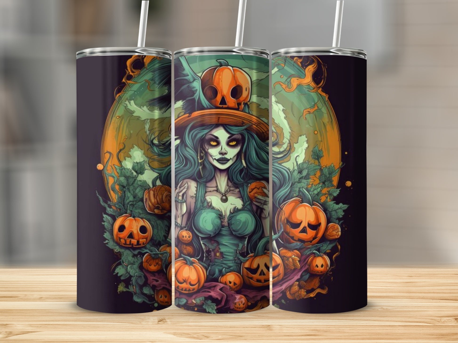 Three tumblers with a Halloween witch and jack-o'-lanterns graphic design.