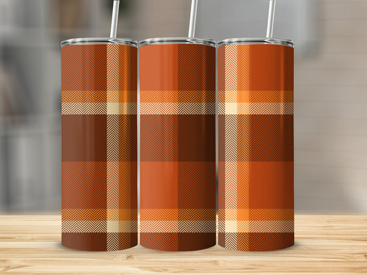 Three tumblers with a warm plaid pattern of brown, orange, and cream.