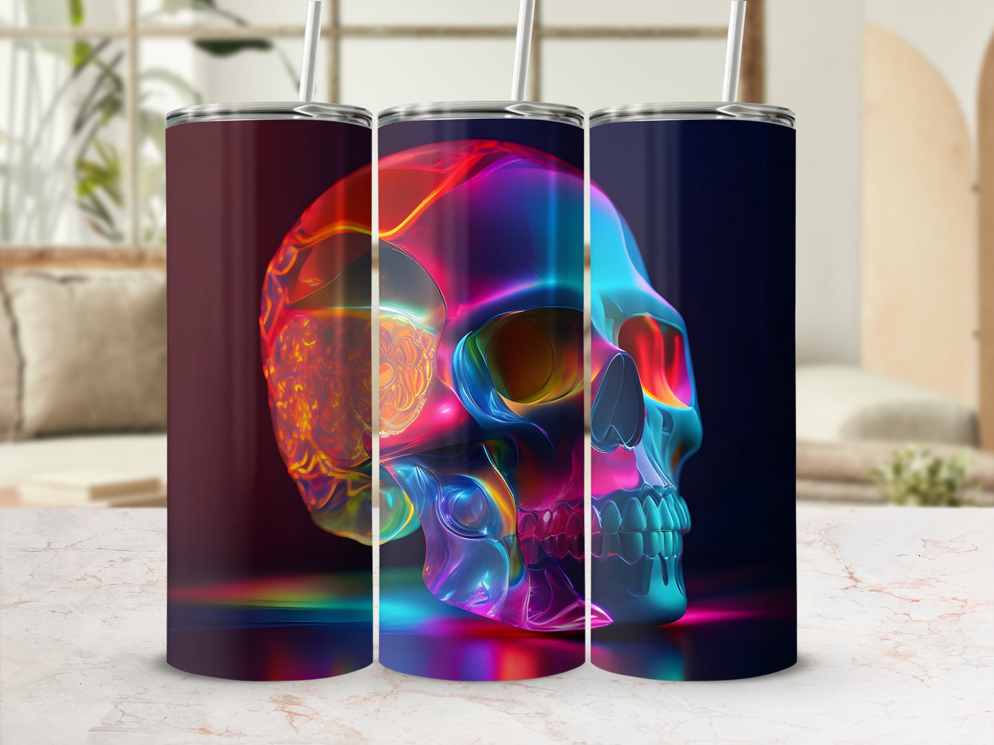 Three iridescent tumblers with colorful skull designs on a patterned surface.