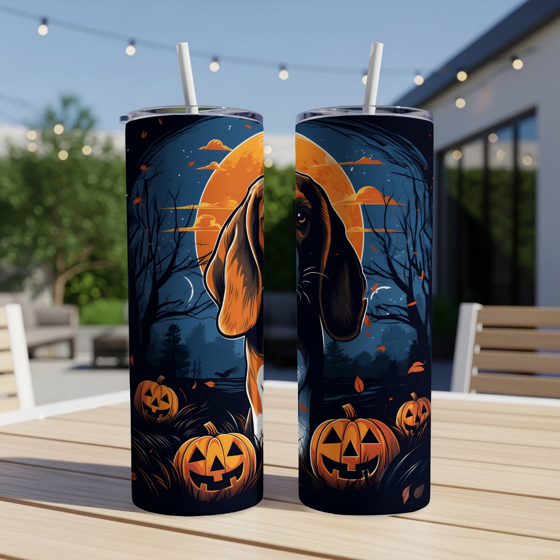 Two tumblers with a Halloween design of a dog, moon, and pumpkins.