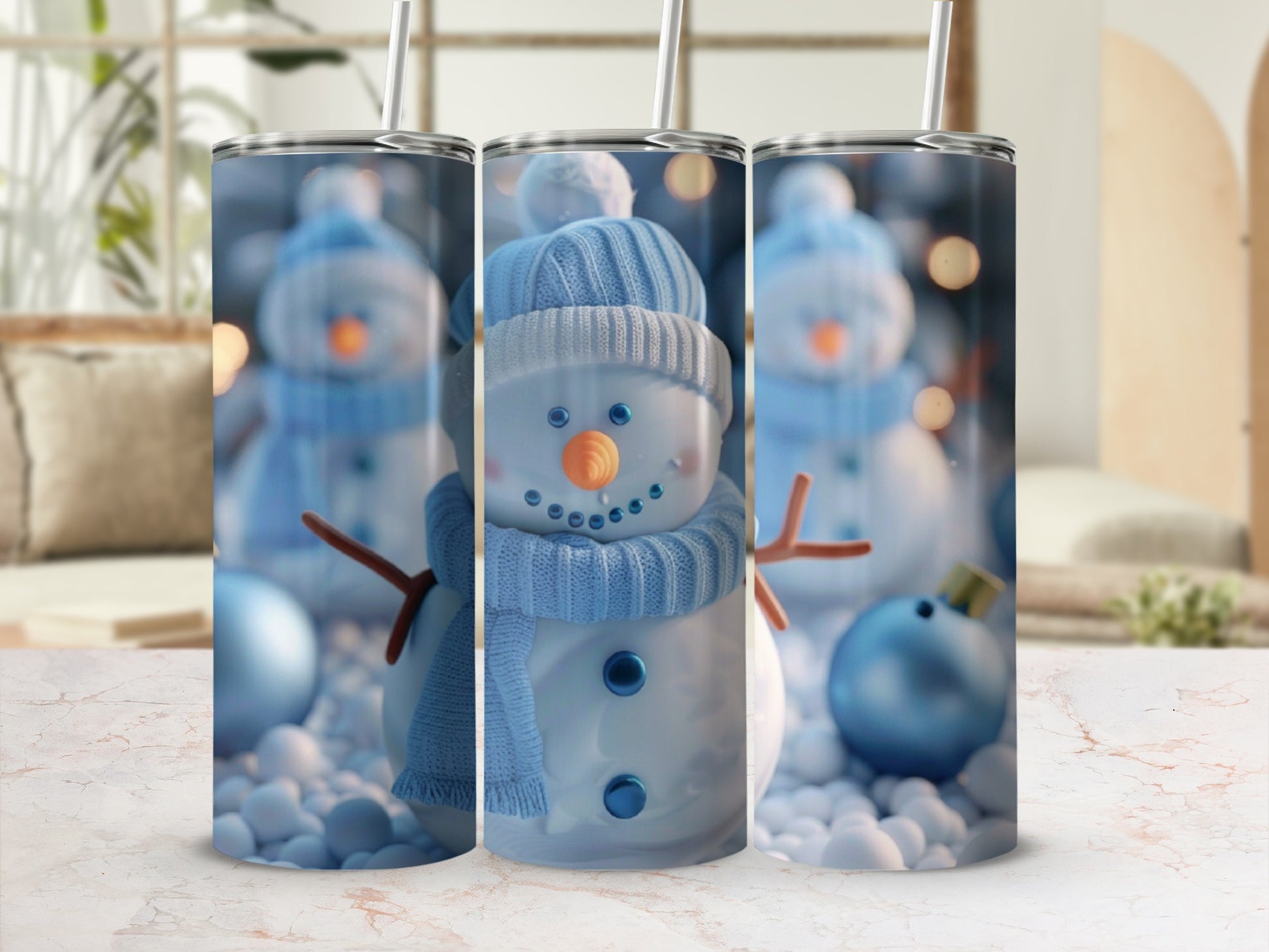Three tumblers featuring a blue-scarfed snowman with orange carrot nose.