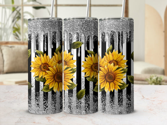 Three tumblers with sunflowers and silver glitter drip design.
