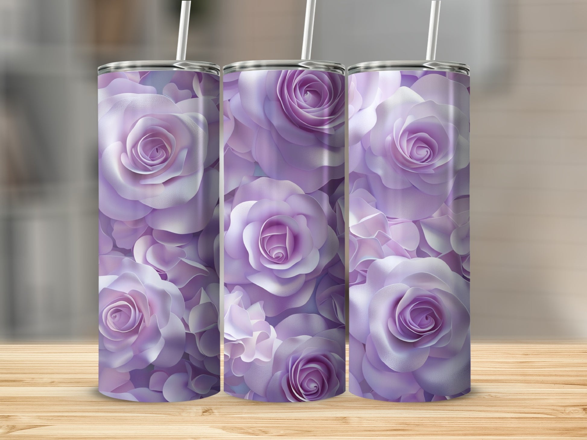 Three tumblers adorned with a repeating pattern of soft purple roses.