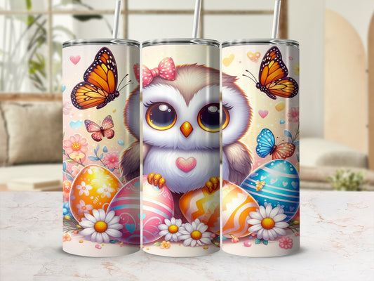 Cute owl and butterflies adorn a pink tumbler with Easter eggs.