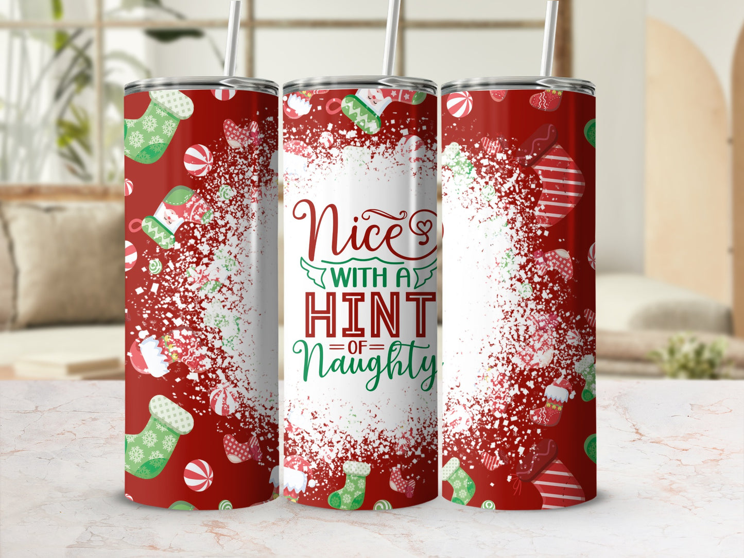 Red tumbler with green Christmas stockings and "Nice with a Hint of Naughty" text.
