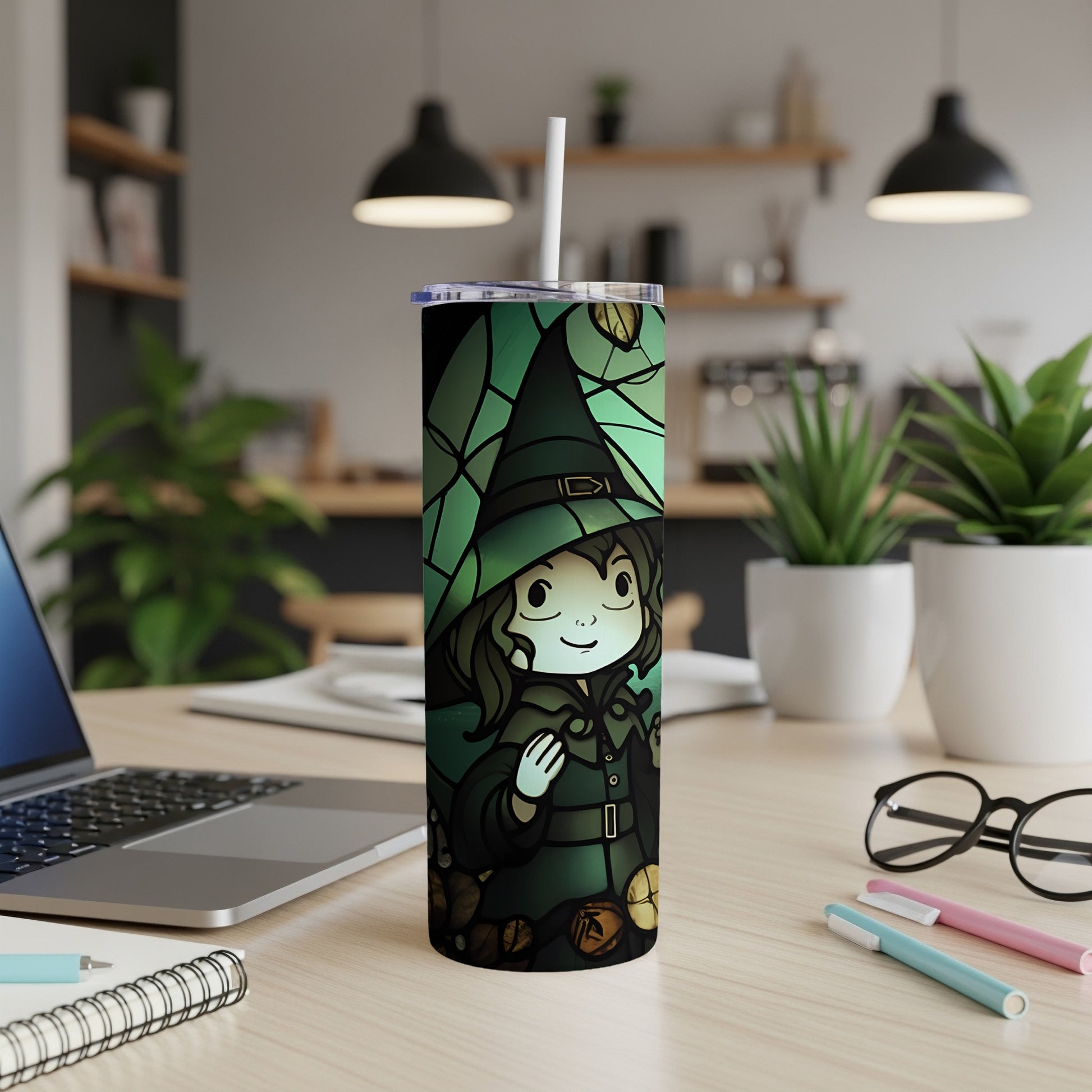 Witch with cauldron and potion design on a tumbler with straw.