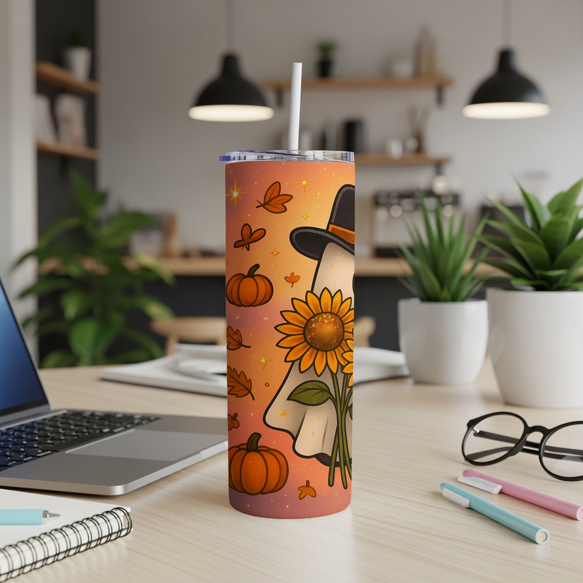Halloween tumbler with ghost, sunflower, pumpkins, and fall leaves design.