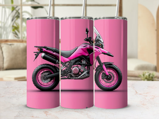 Pink motorcycle tumbler with straw on a white countertop.