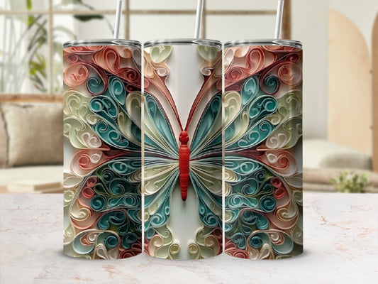 Three tumblers with a colorful, intricate butterfly design.