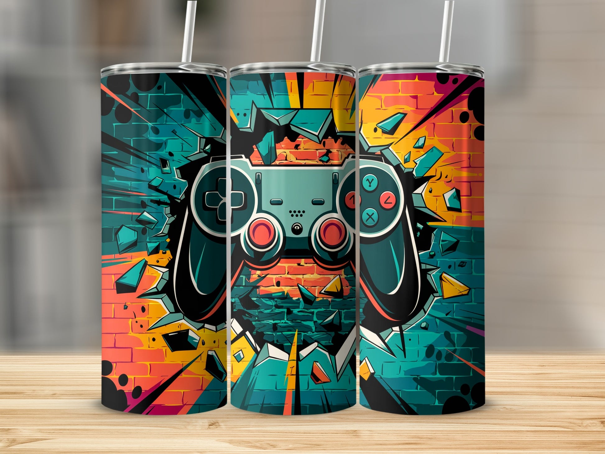 Three tumblers with a video game controller breaking through a brick wall.