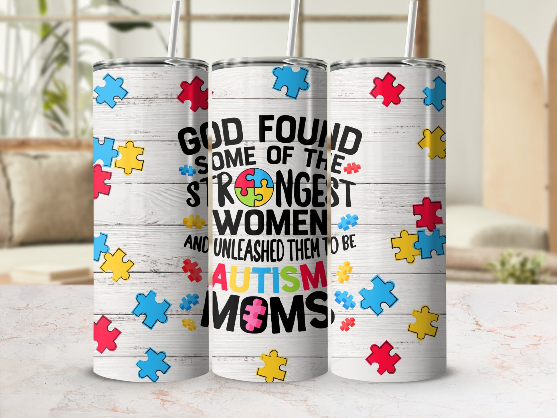 Tumbler with puzzle pieces and text "God found some of the strongest women and unleashed them to be Autism Moms".