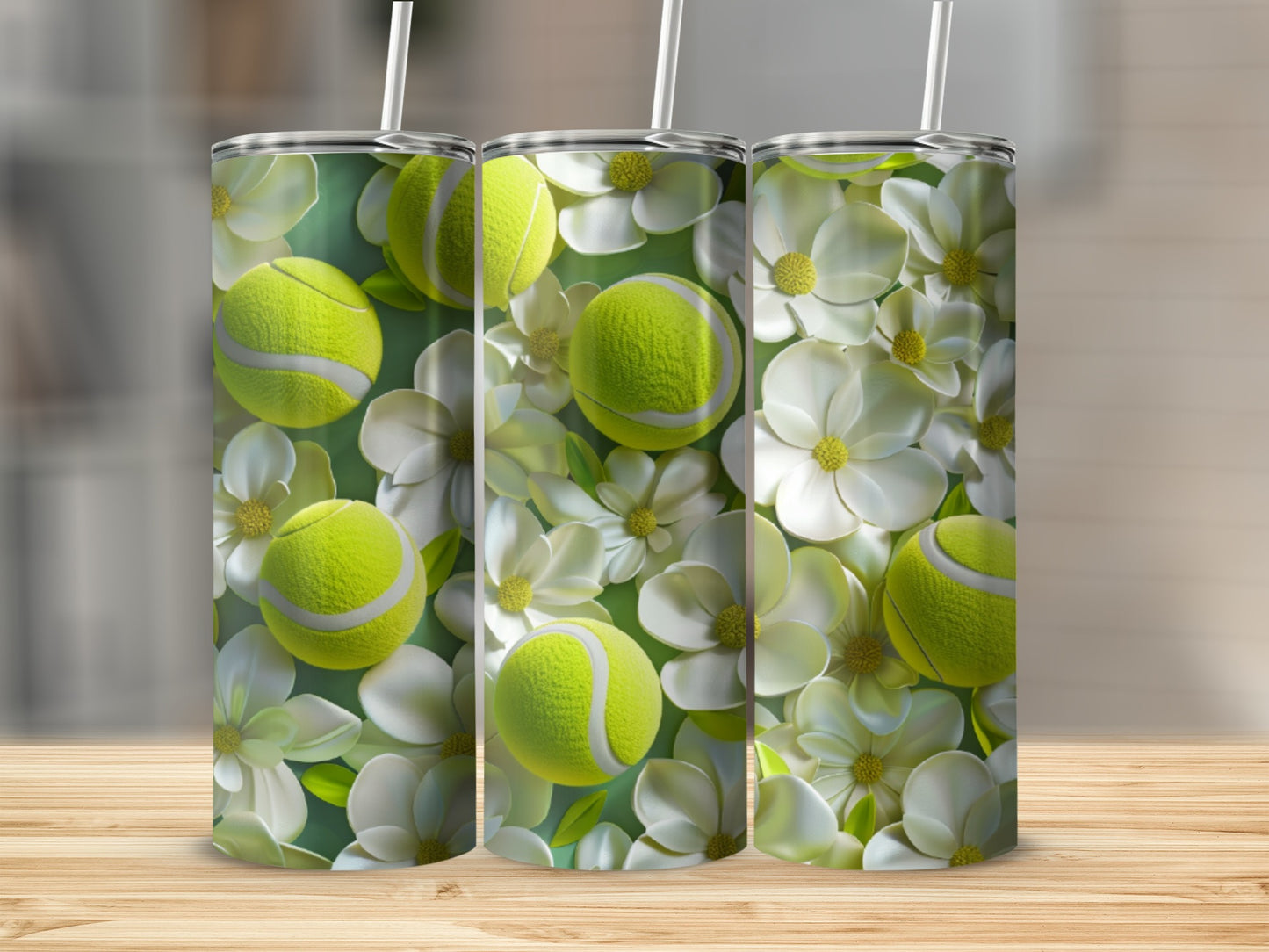 Three tumblers with a tennis ball and white flower pattern.