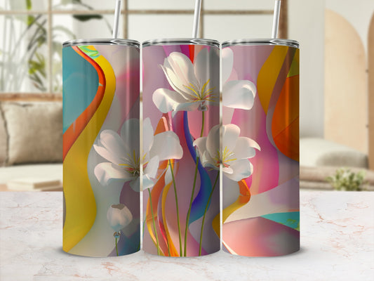 Three tumblers with floral and abstract colorful designs.