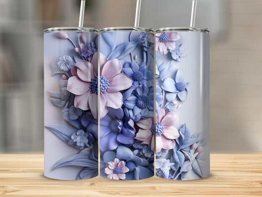 3D floral pattern tumblers with straws on a wooden surface.