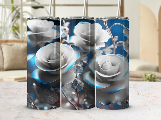 Three silver rose tumblers with blue floral accents on a marble surface.