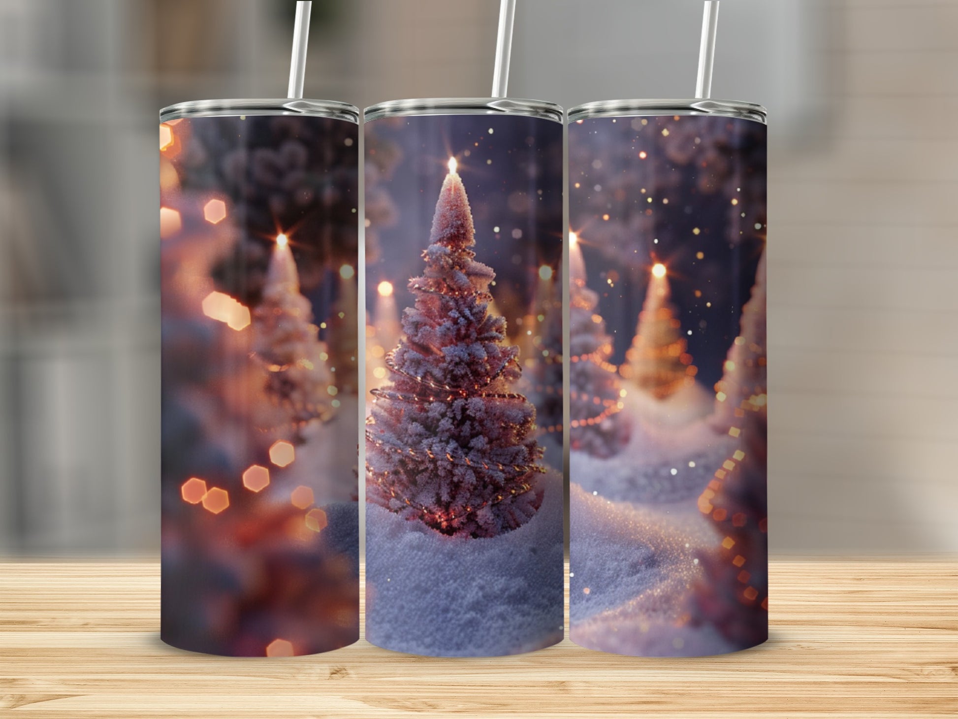Three tumblers with a snowy Christmas tree and bokeh lights design.