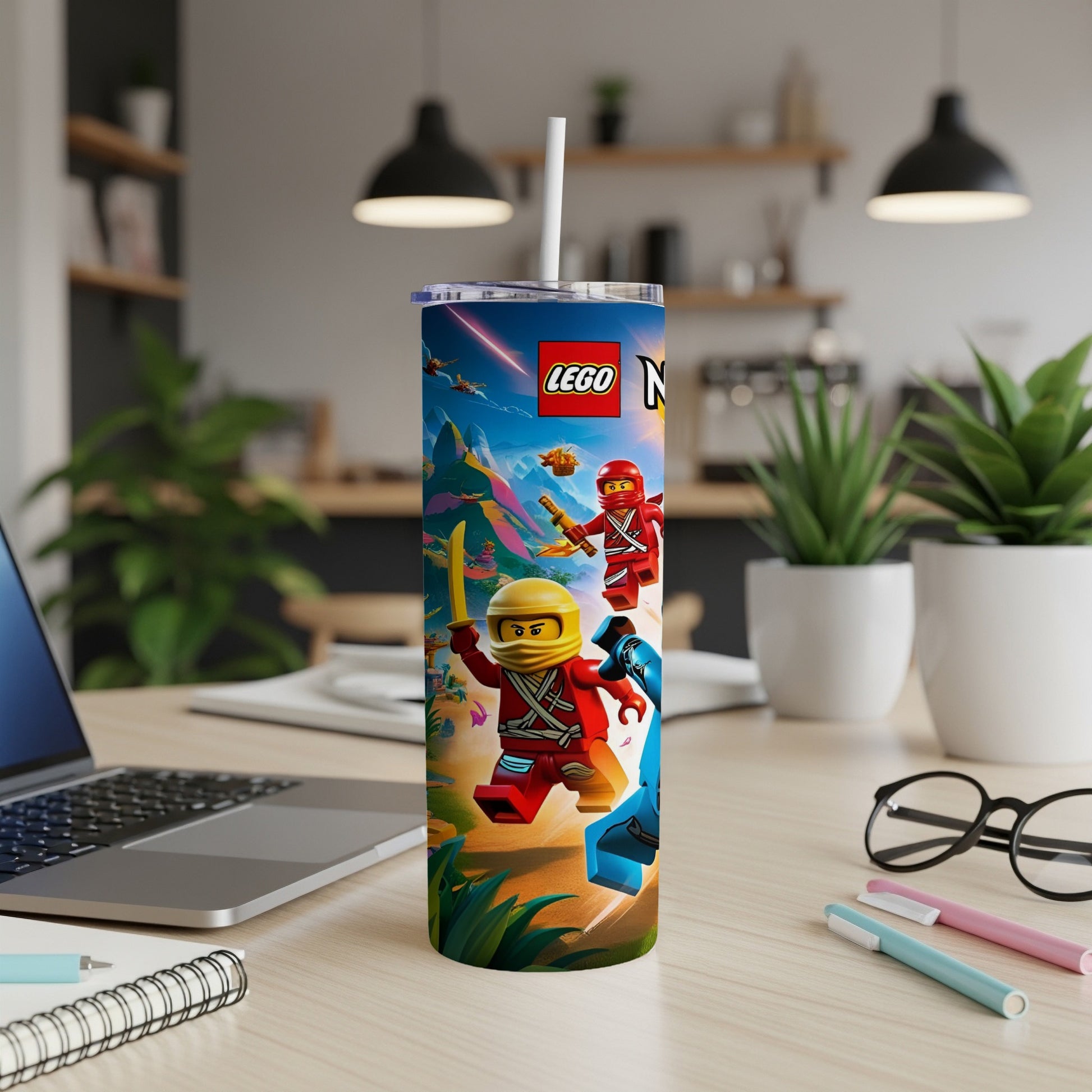 LEGO Ninjago characters on a blue tumbler with a straw.