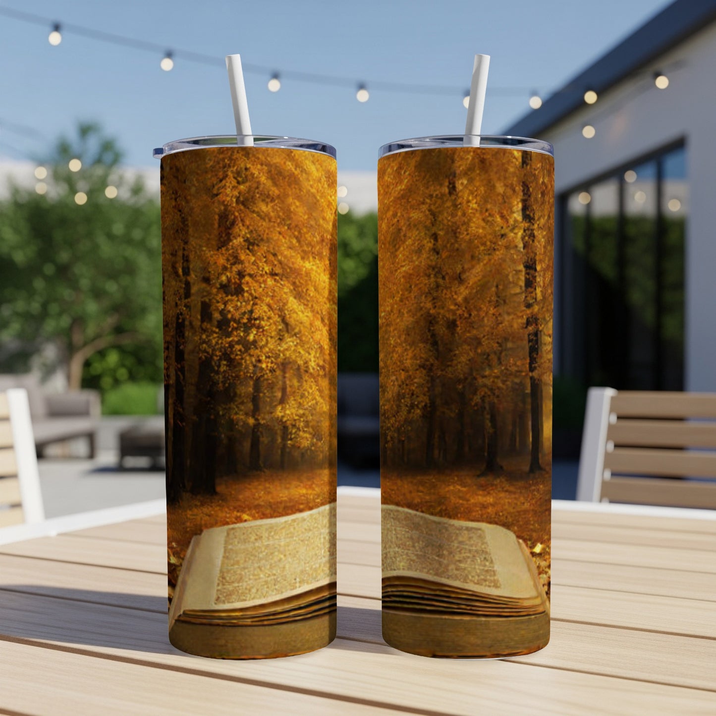 Two tumblers featuring an autumn forest and open book design.