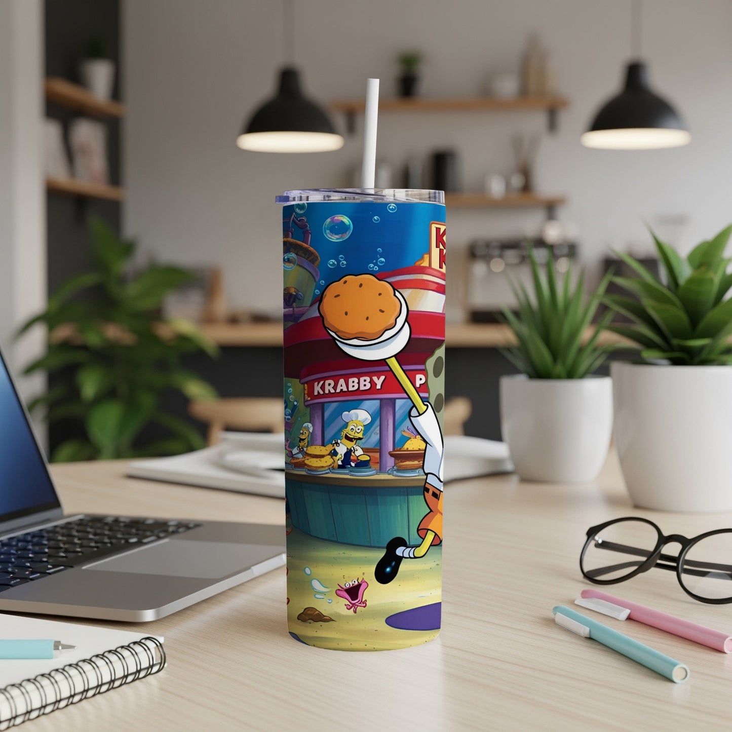 SpongeBob Krabby Patty tumbler with cartoon characters and kitchen background.