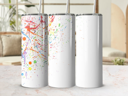 Three white tumblers with colorful paint splatter designs.