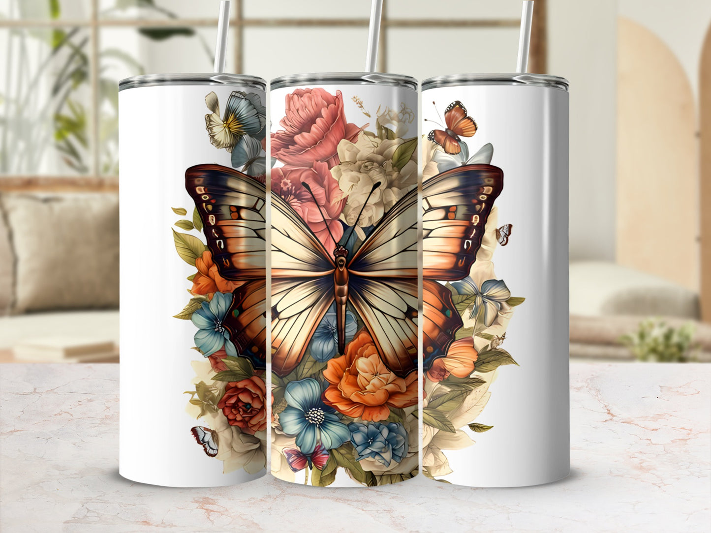 Butterfly and floral design on three white tumblers.