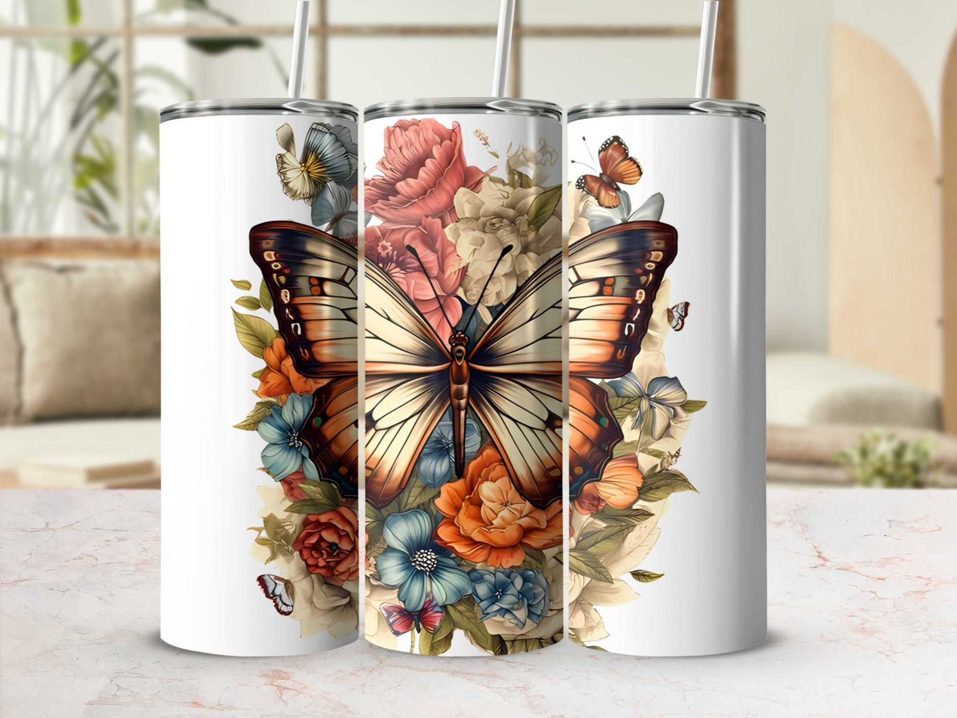 Butterfly and floral design on three white tumblers.