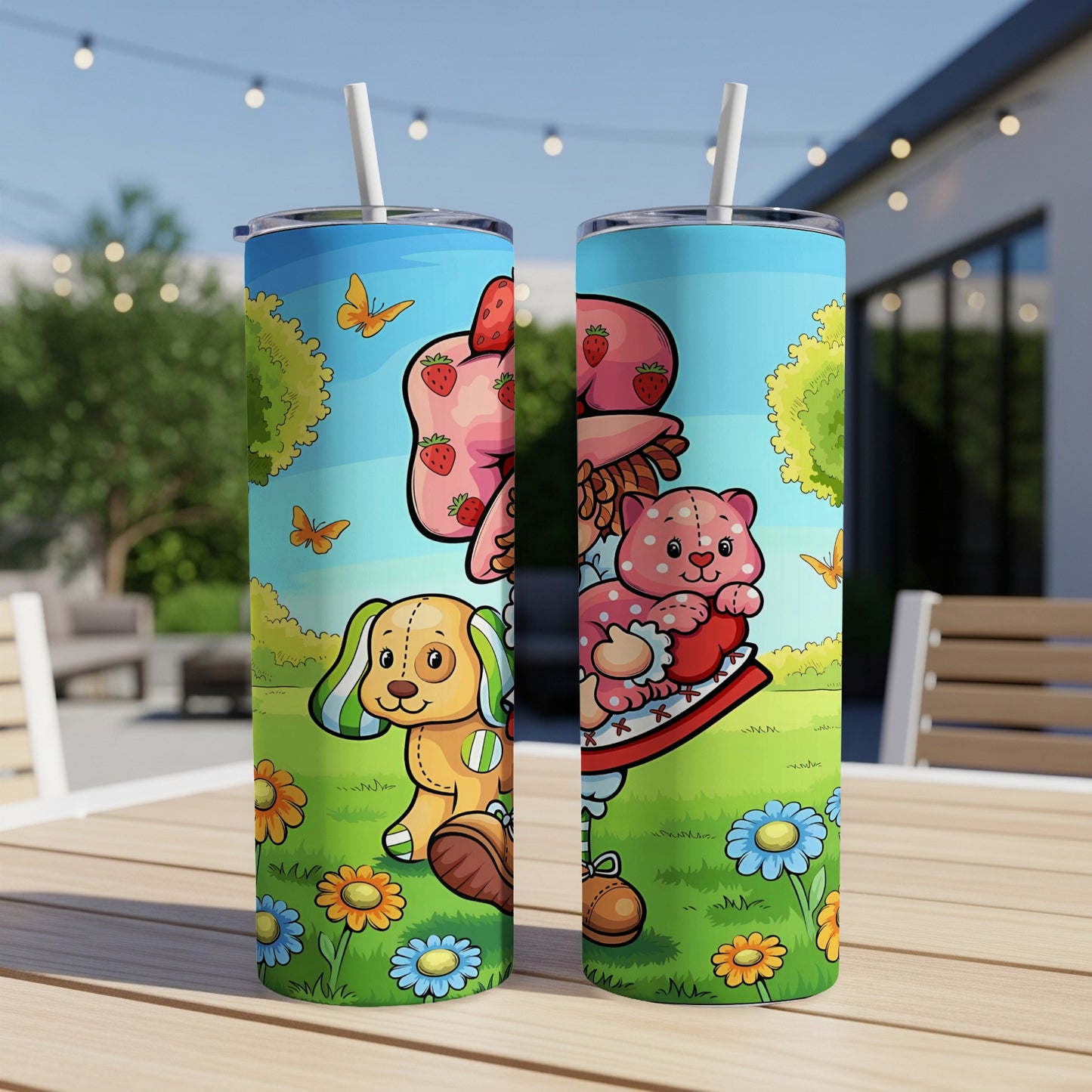 Strawberry Shortcake and her friends on a patterned tumbler cup.