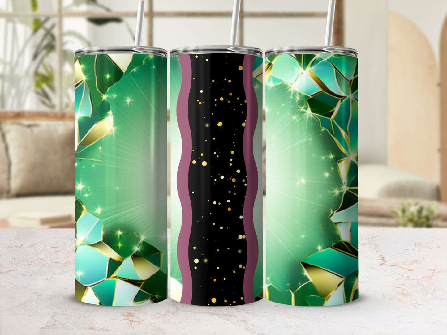 Green abstract geometric tumbler with gold sparkle accents and straw.