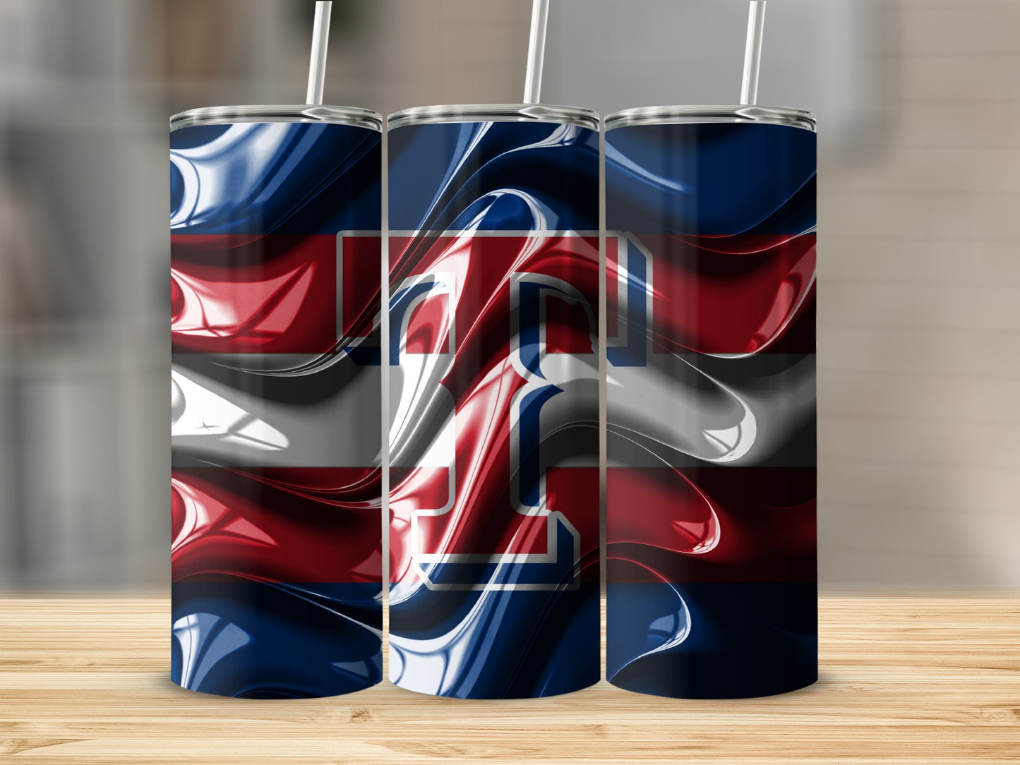 Graphic White TT Logo with Flowing Color Tumblers