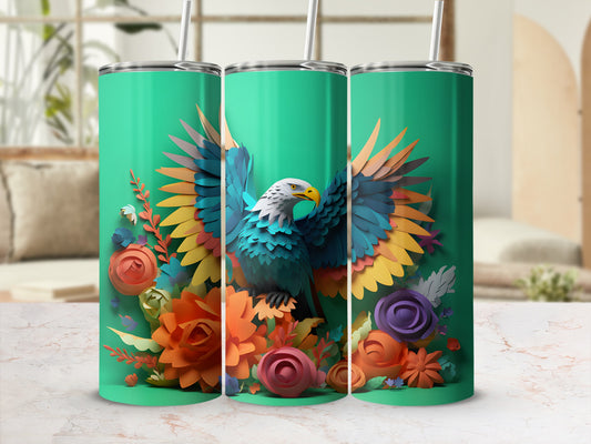 Turquoise tumbler with colorful eagle and floral design.