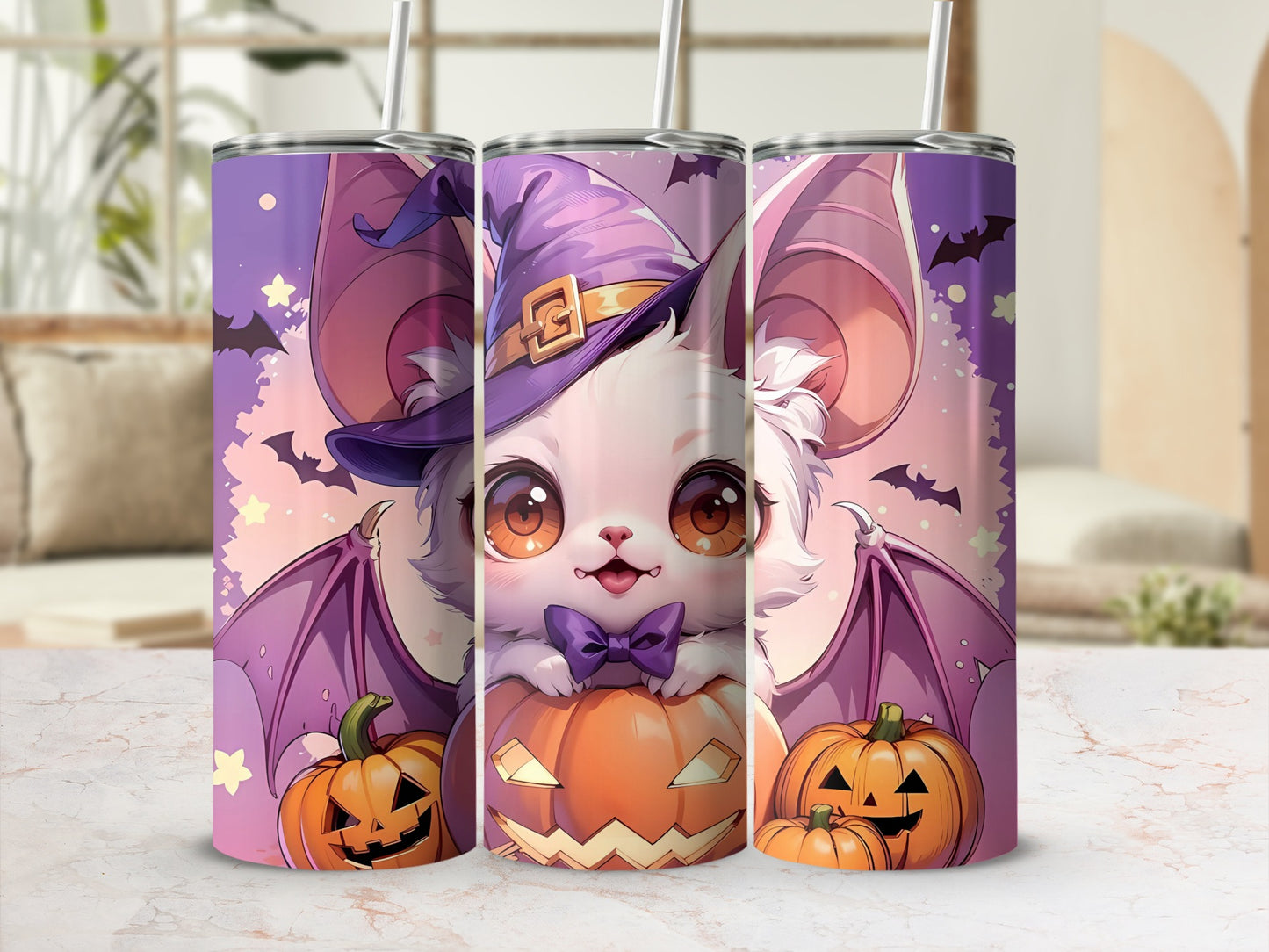 Halloween bat character wearing witch hat on tumblers with pumpkins.