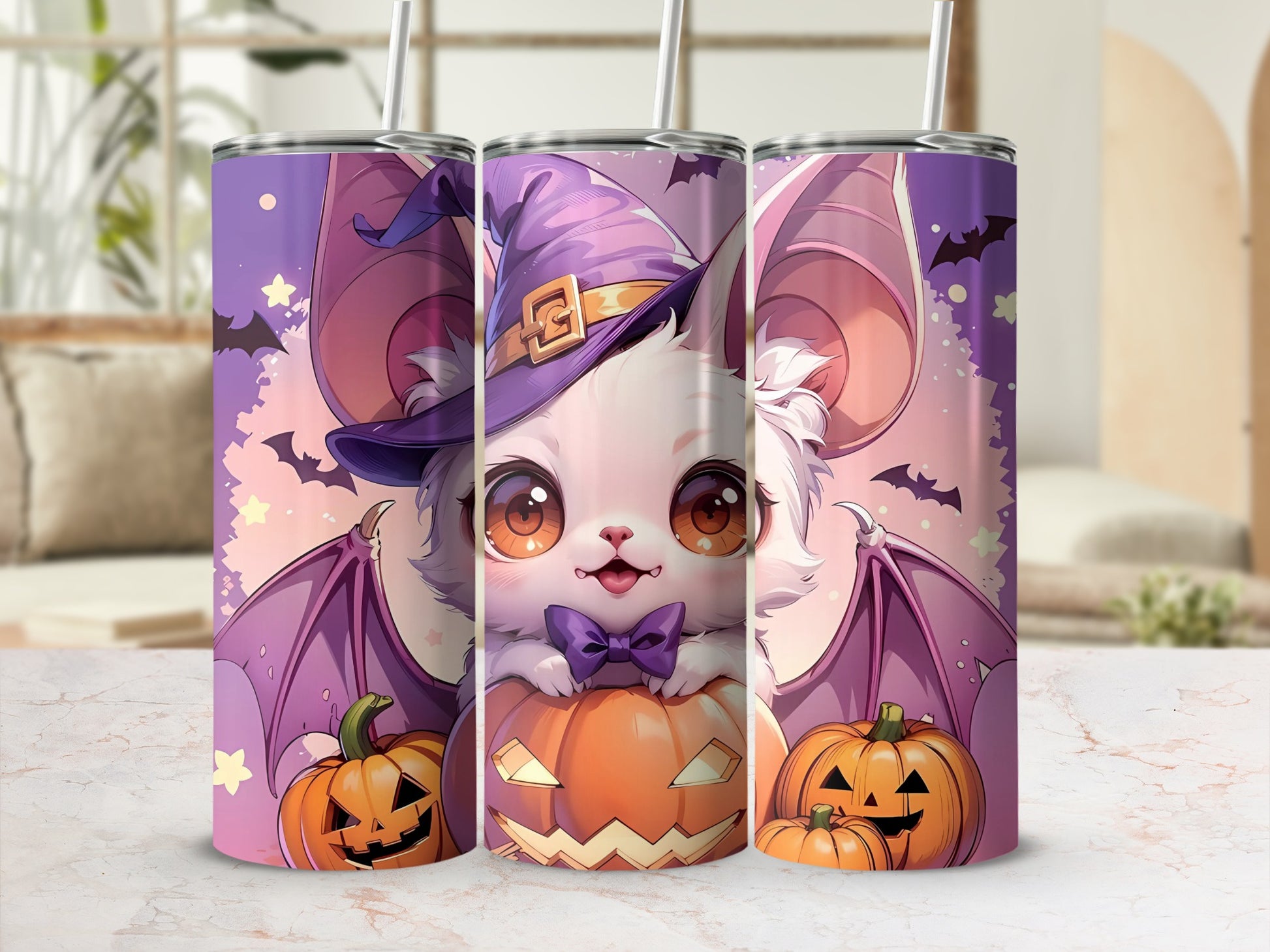 Halloween bat character wearing witch hat on tumblers with pumpkins.