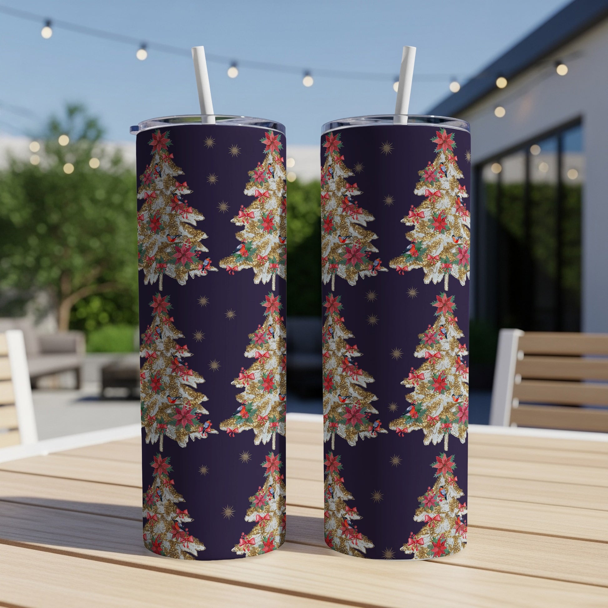 Two tumblers with a repeating Christmas tree pattern on a dark background.