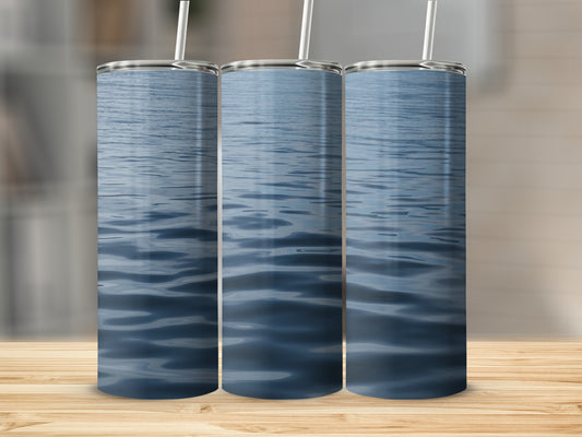 Three tumblers with a rippling blue water design.