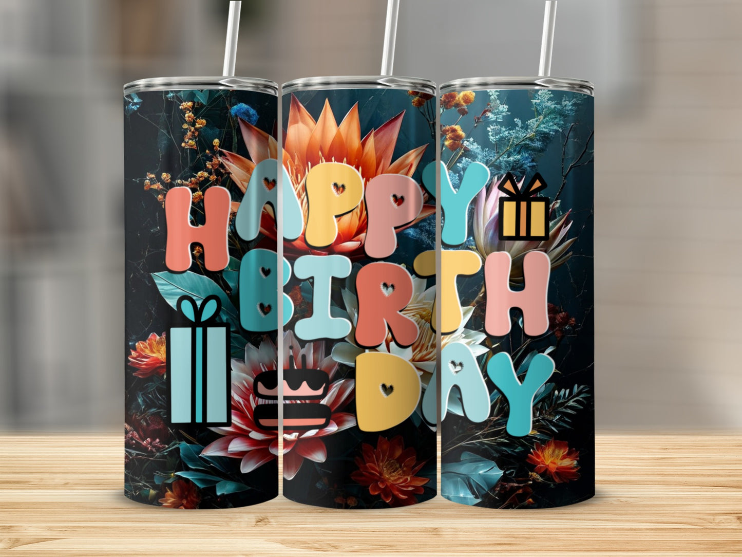 Happy Birthday tumbler with floral background and gift boxes.