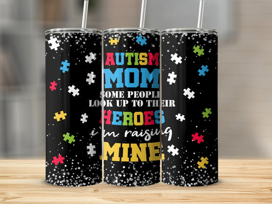 Autism Mom tumbler with puzzle pieces and "Heroes" text.