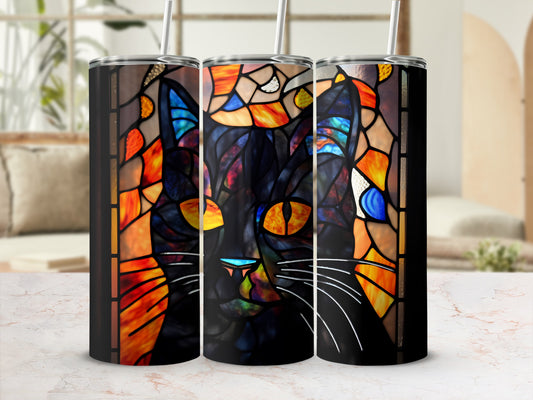 Black cat stained glass design on a tumbler with a straw.