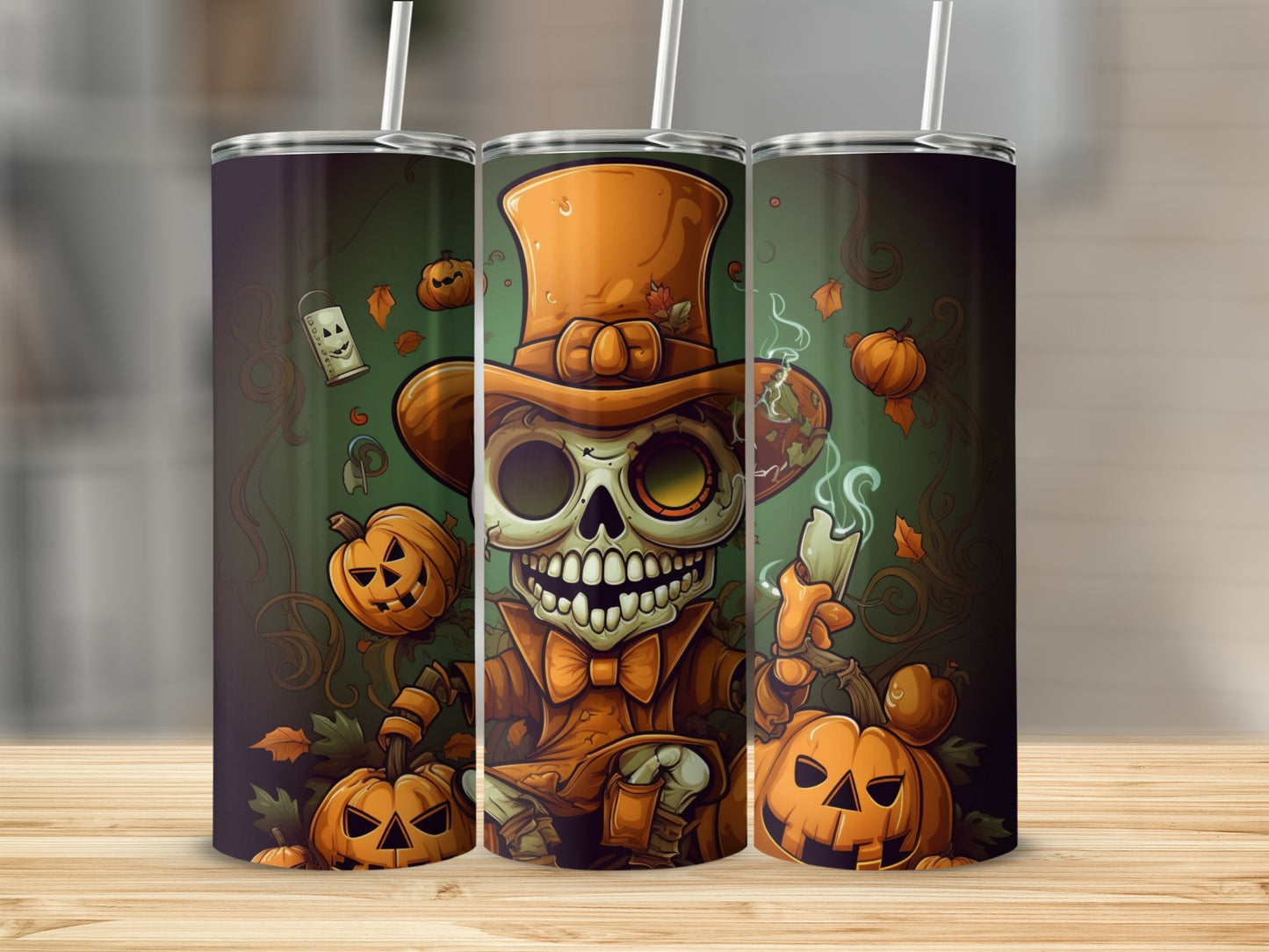 Three tumblers with a Halloween design featuring a skeleton in a top hat and pumpkins.