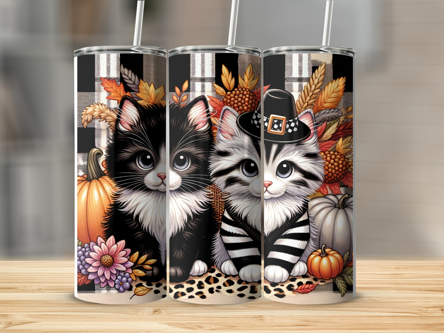 Two cute kittens with autumn leaves, pumpkins, and a plaid background.