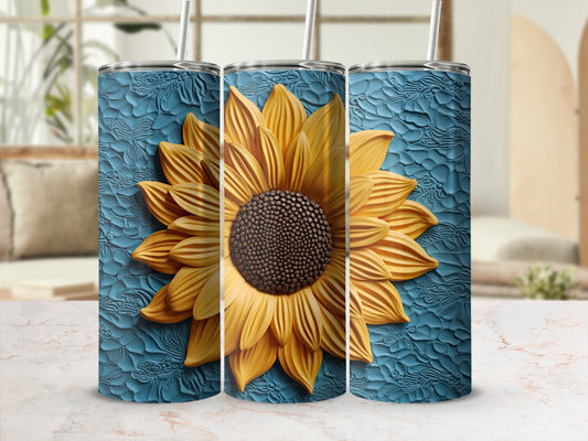 Three tumblers with textured blue wrap and a large yellow sunflower design.