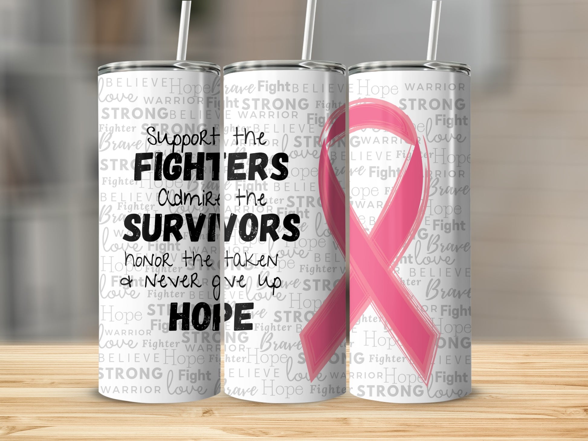 Tumbler with breast cancer awareness ribbon and encouraging words.