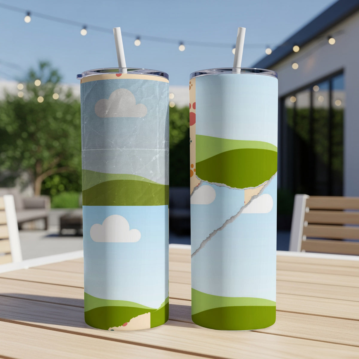 Two tumblers with a sky and rolling green hills design, one with torn paper detail.