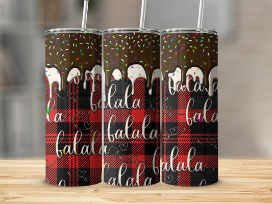Three tumblers with chocolate drizzle, sprinkles, and "falala" text on plaid background.