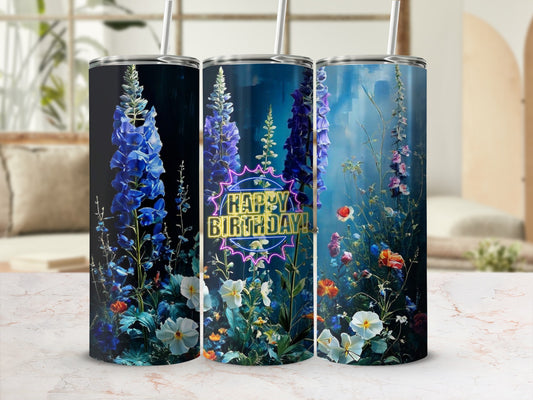 Tumbler with blue flowers and "Happy Birthday!" in neon lettering.