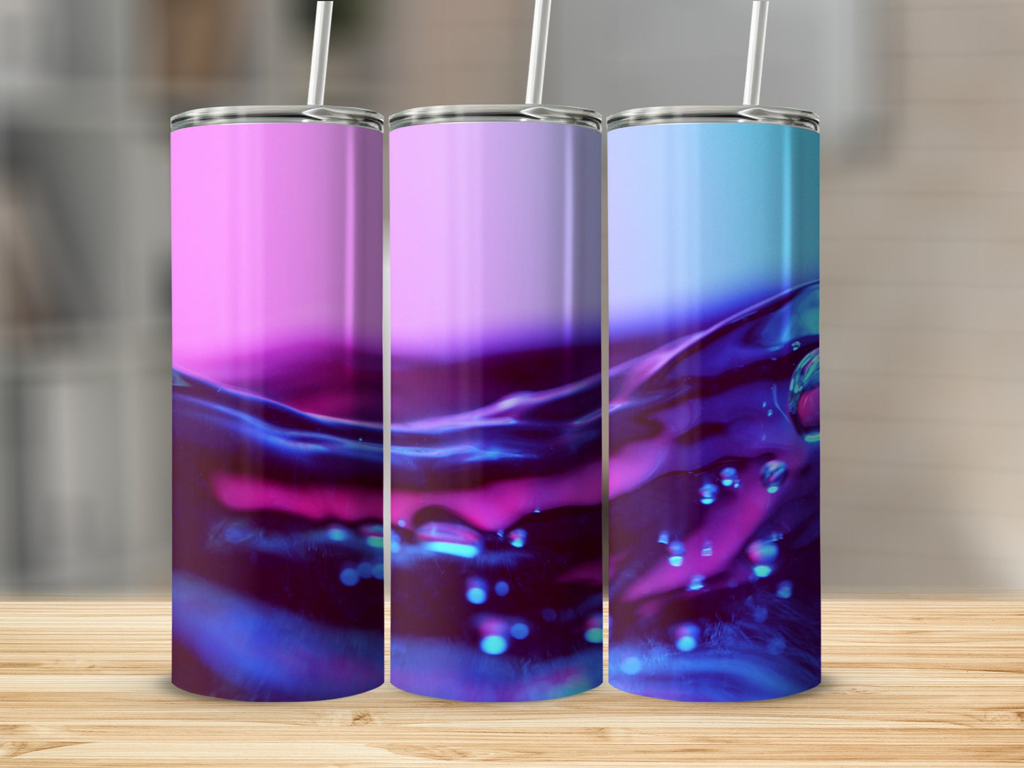 Three tumblers with a vibrant, abstract purple and blue liquid design.