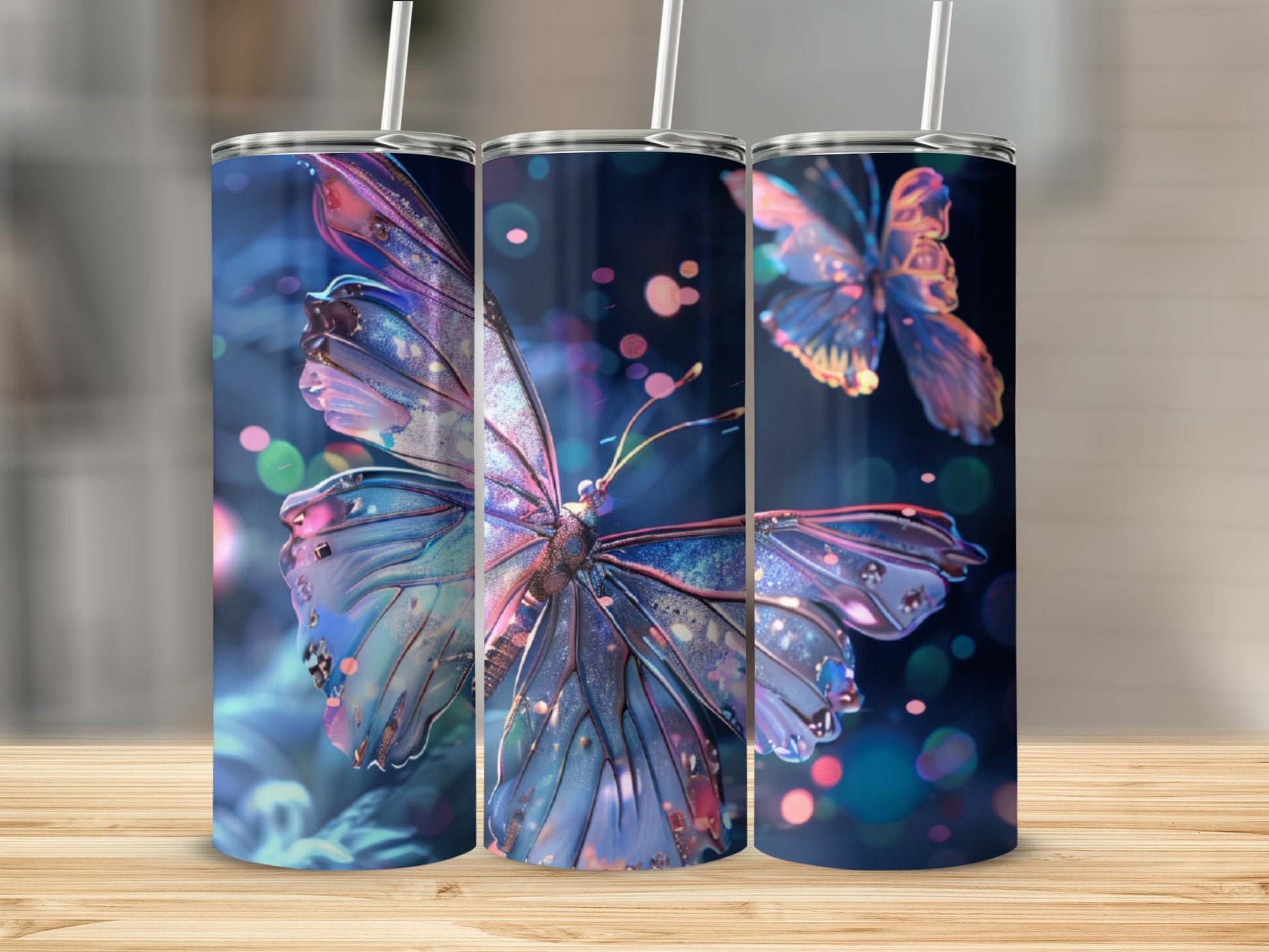 Three tumblers with iridescent butterfly designs, glowing bokeh lights.